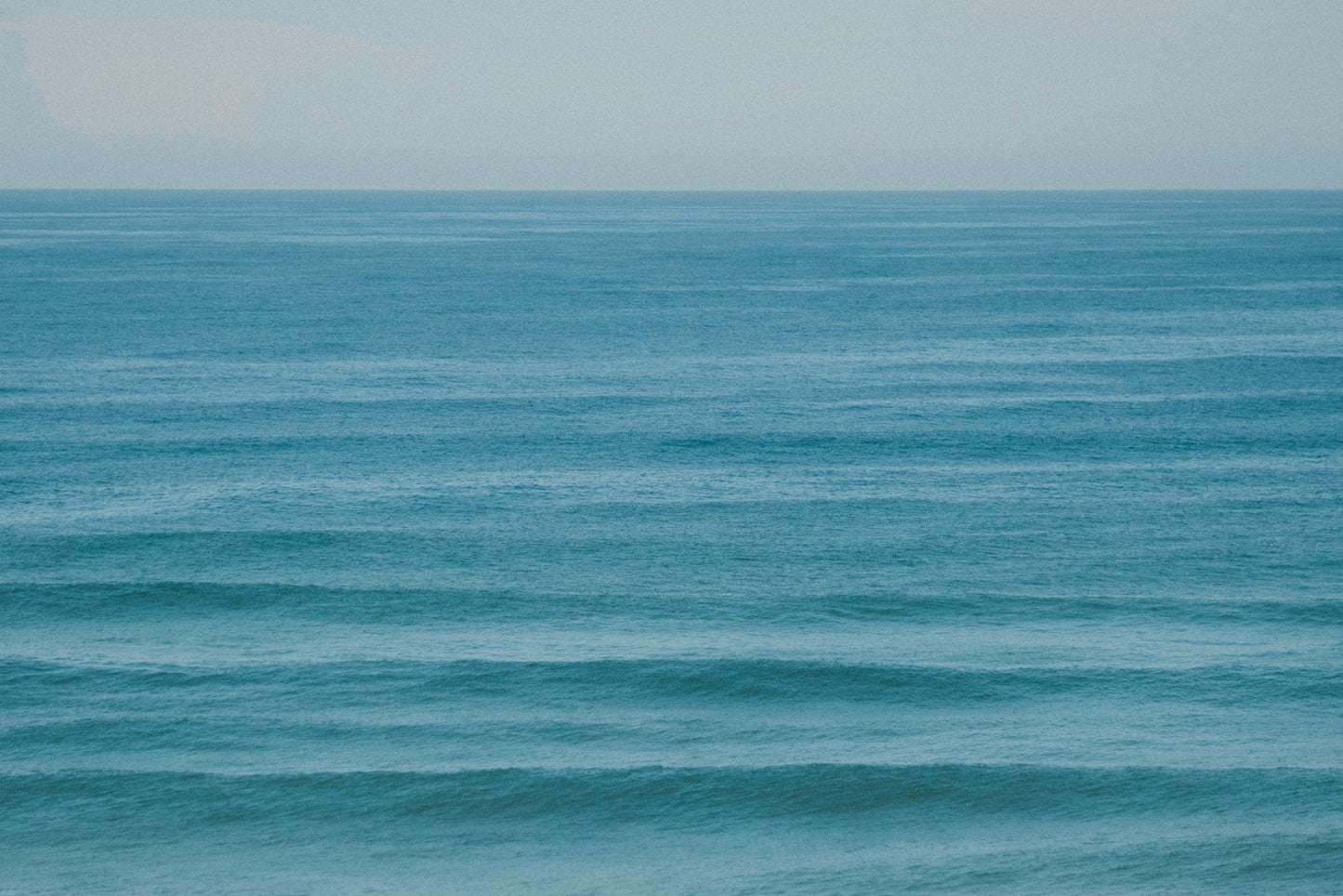 Shelly Haze – Aerial Coastal Print of Shelly Beach, NSW