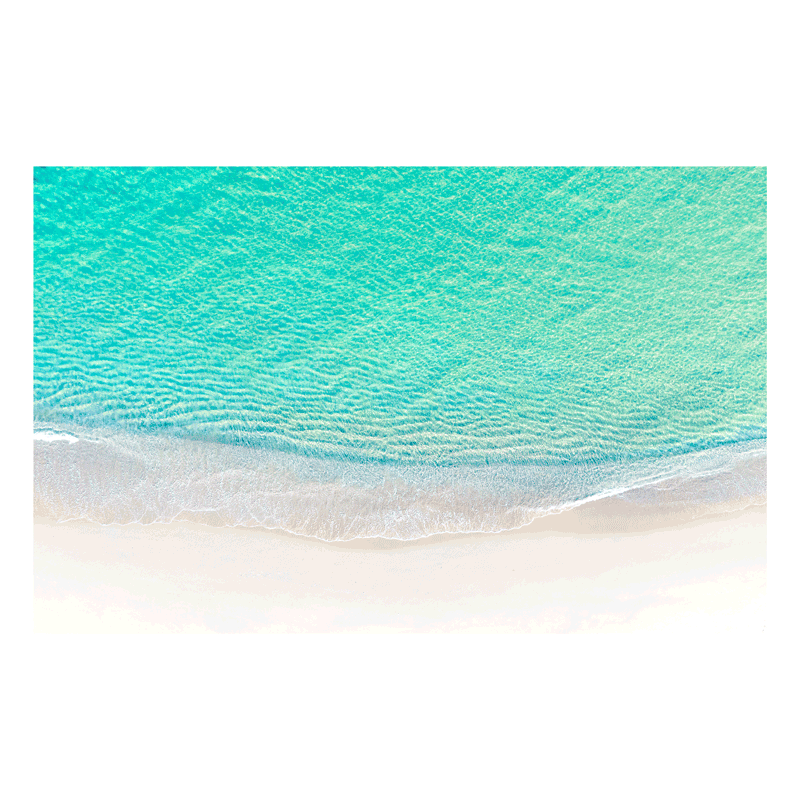 A stunning aerial ocean print of Forresters Beach, NSW, featuring crystal-clear aqua waters meeting soft white sand in a tranquil coastal scene.
