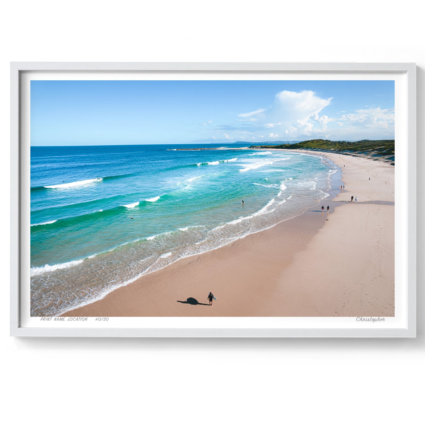 A stunning aerial view of Soldiers Beach, Norah Head, NSW, featuring rolling waves, golden sand, and beachgoers enjoying a sunny day by the sea.