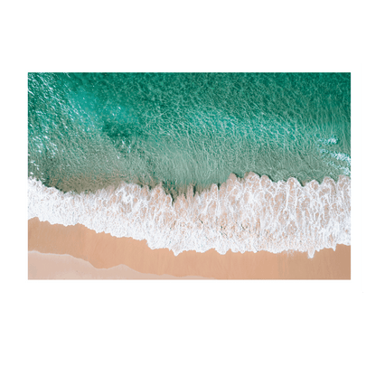 Aerial view of waves rolling onto the golden sand at Bateau Bay, NSW, creating a striking contrast between turquoise water and foamy white surf.